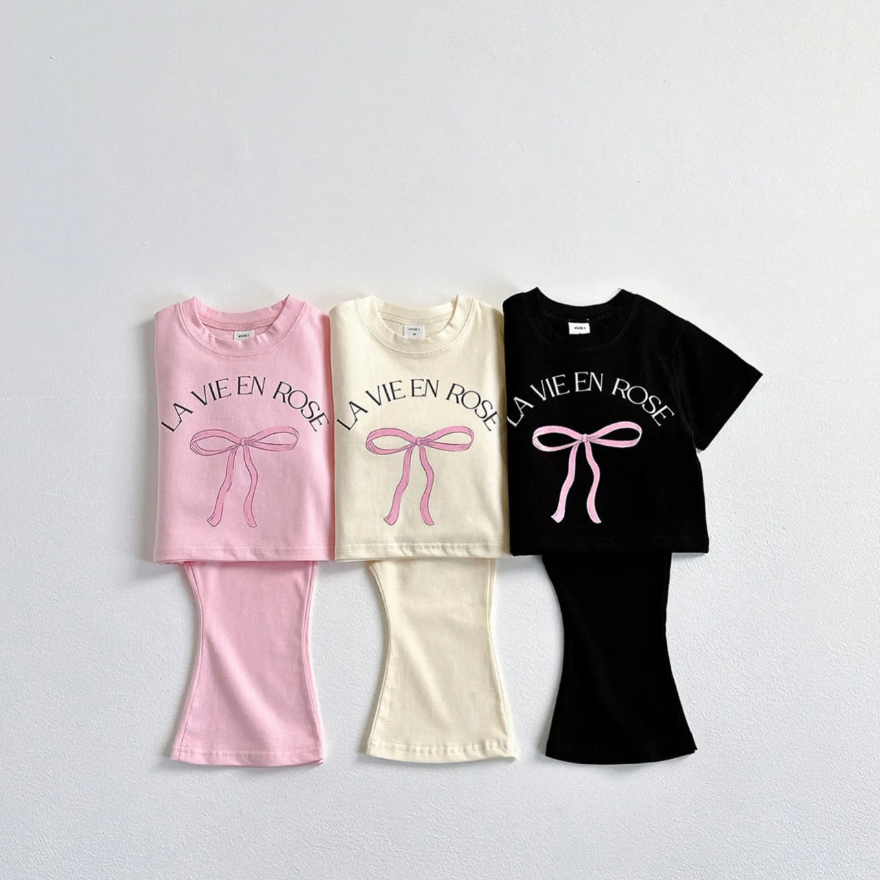 

2025 Summer New Children Short Sleeve Clothes Set Girls Bow Letter Print T Shirts + Flared Pants 2pcs Suit Kids Casual Outfits