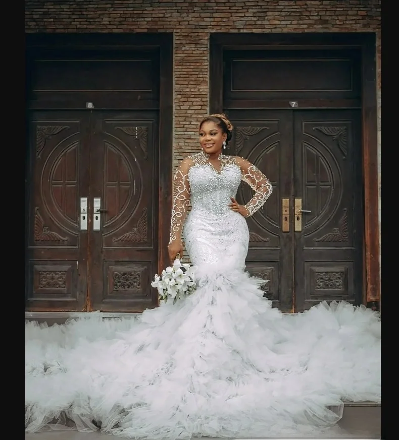 

Customized High Collar Sparkly Crystals Beads Mermaid Wedding Dress Vestidos De Casamento Long Sleeves Tiers Bridal Gown 2025
