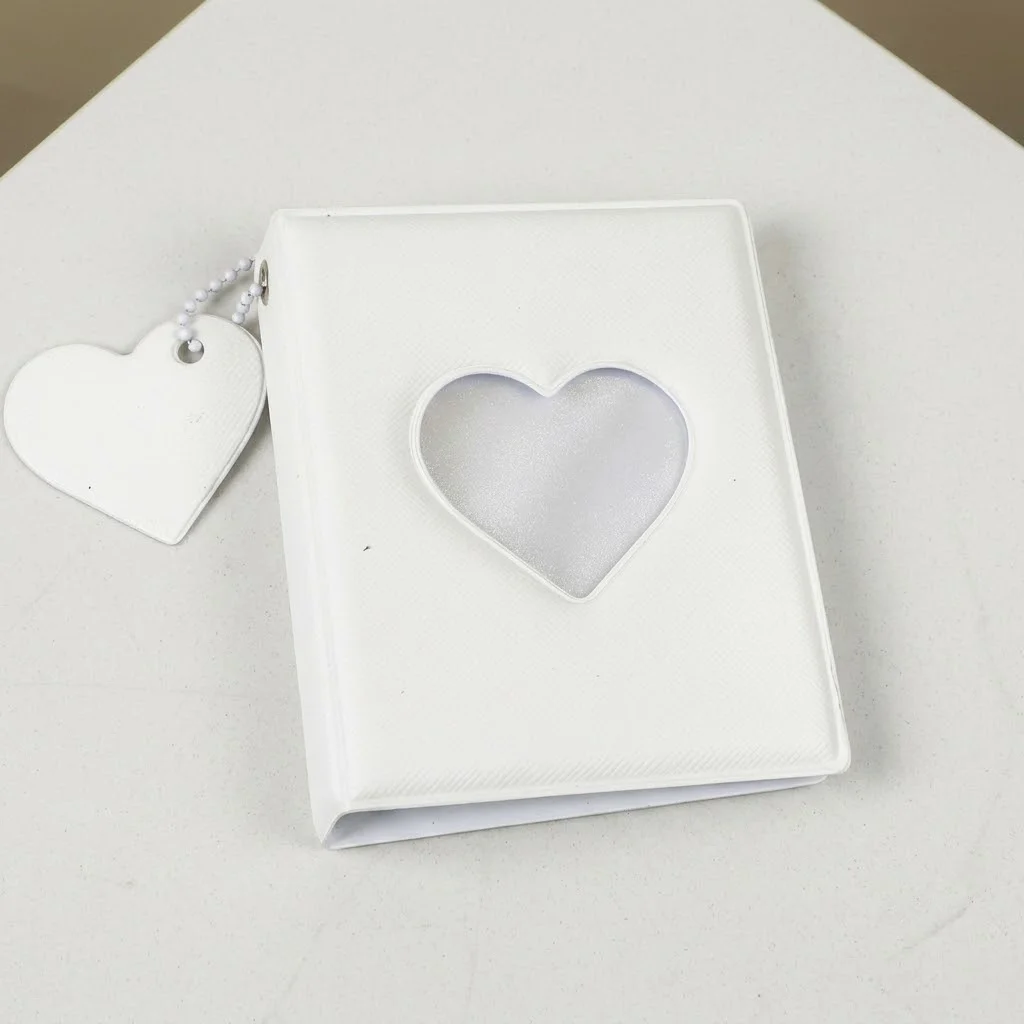Ein 3-Zoll-Fotoalbumhalter zur Aufbewahrung von Fotos, mit herzförmigem Design, praktisch zum Mitnehmen. – Detail 1