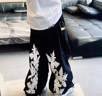 American high street casual pants with drawstrings, loose pleated wide legs, jazzy parachute workwear, dancing sports long pants