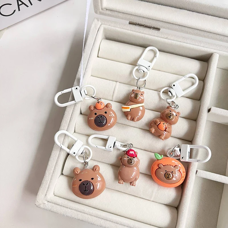 Porte-clés de dessin animé Capybara, joli porte-clés en résine, pendentif de sac Kawaii, sac à dos, étui pour écouteurs, breloques, cadeaux pour filles