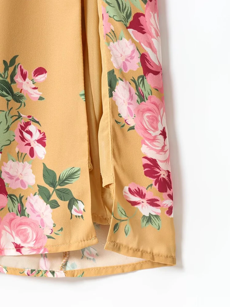 Letnia nowa damska francuska retro sukienka na ramiączkach z kwiatowym nadrukiem, podkreślająca figurę, z rozcięciem, idealna na wakacje.