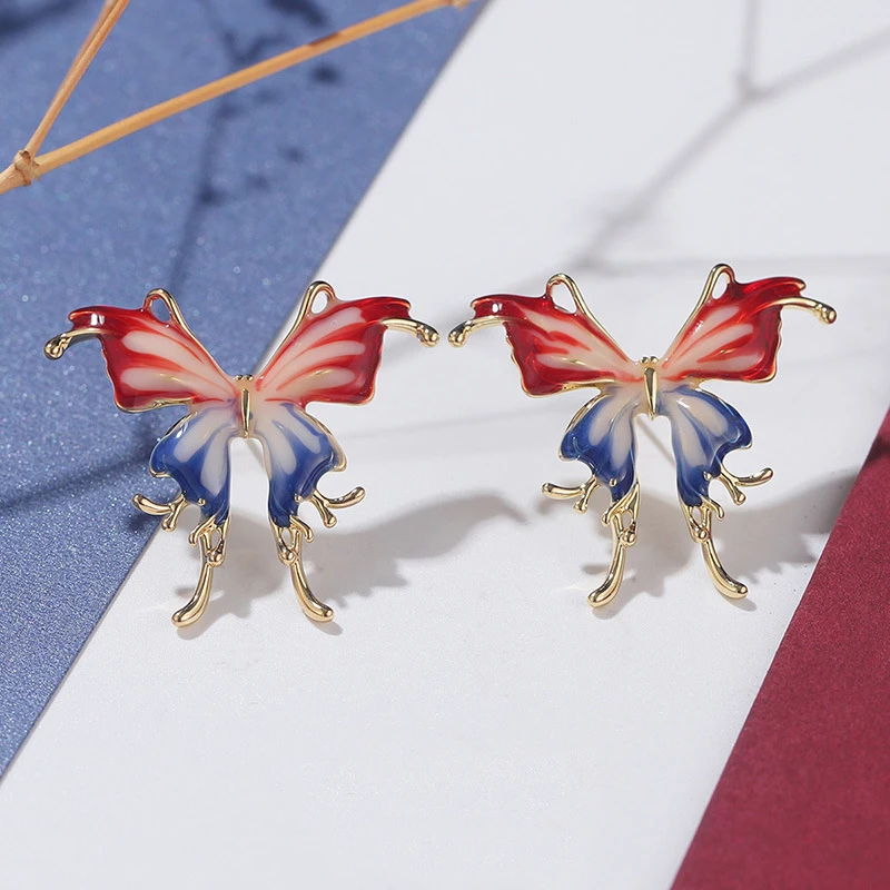 Paris themed red and blue butterfly earrings with a high-end feel, new French contrasting color design, summer women's earrings