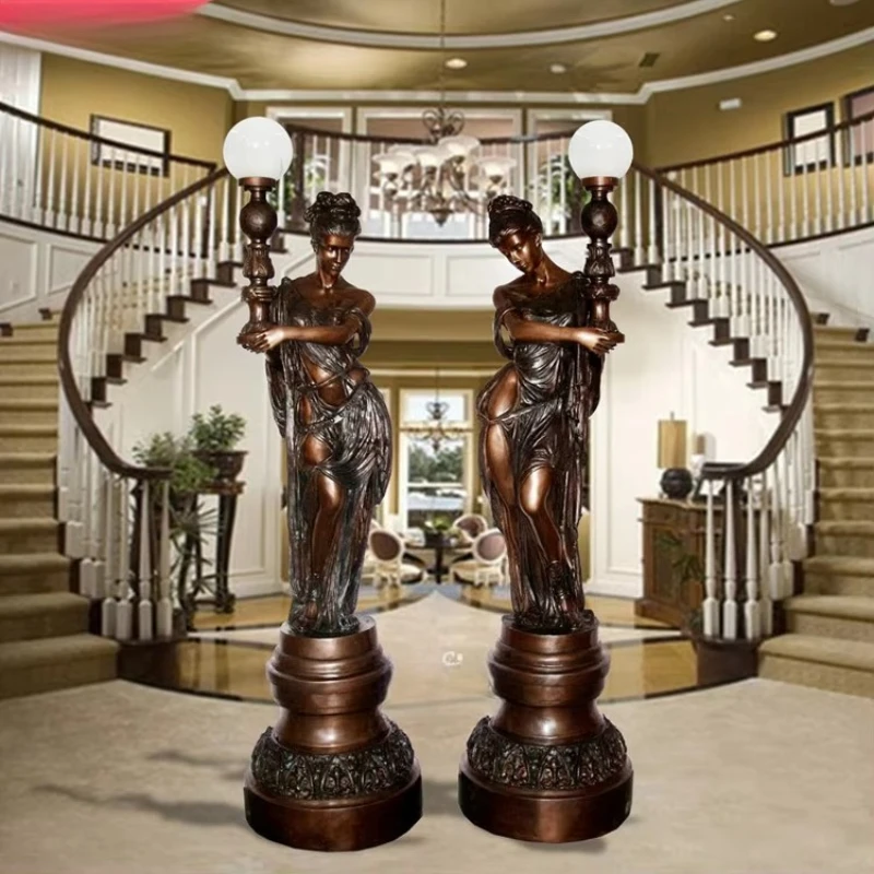 

Elegant Interior Bronze Standing Lady Torch Landing Pair
