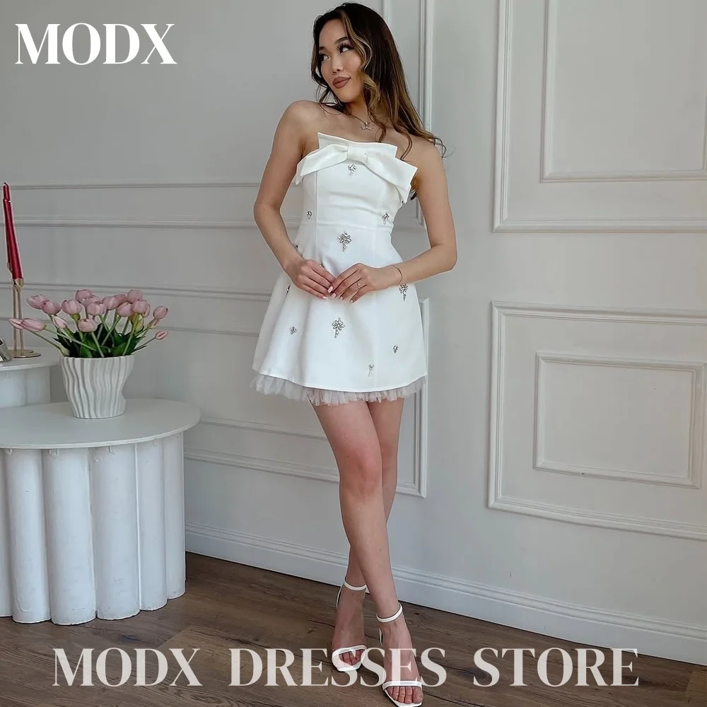 

MODX Мини-платья для выпускного вечера без бретелек Матовые платья без рукавов с бантом из бисера Тюлевые платья для дня рождения Вечерние платья по индивидуальному заказу 2025