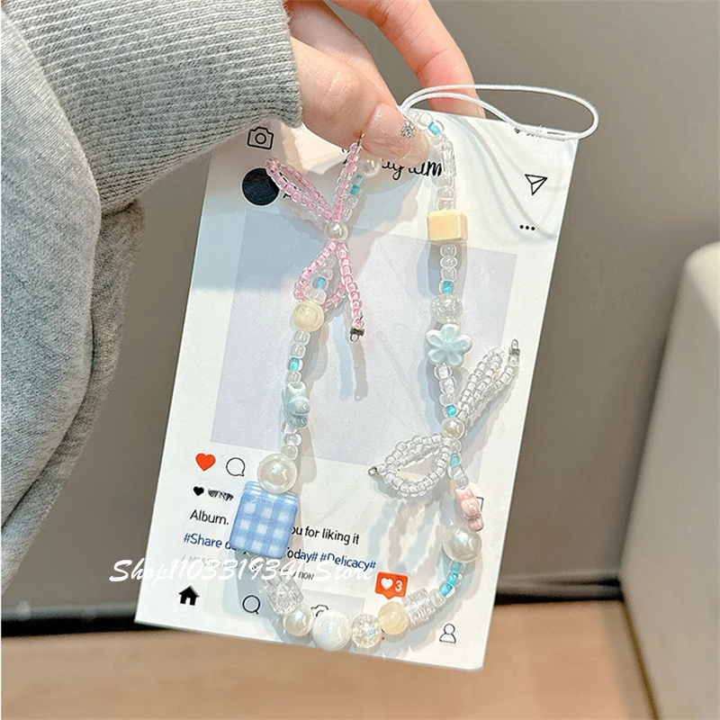 

Korean Cute 3D Pink Bowknot Blue Flower Bead Phone Charms Chain For Phone Accessories Phone Strap Anti-Lost Lanyard Hanging Rope