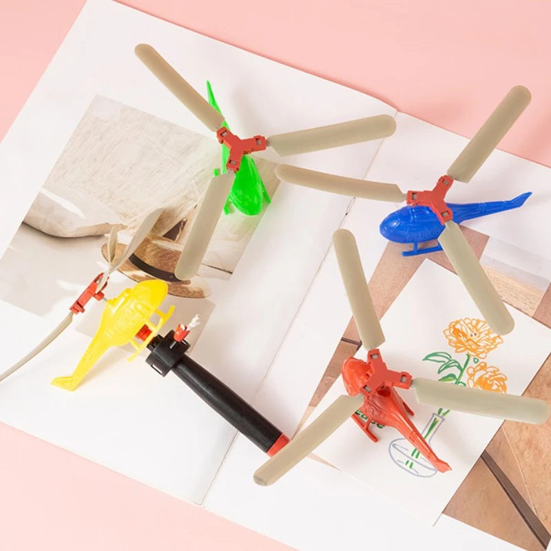 1PCS Kids Outdoor Sports Flying Toys Handle Pull Wire Planes Toys Flying Toy Helicopter for Kids, 360° Rotating Helicopter