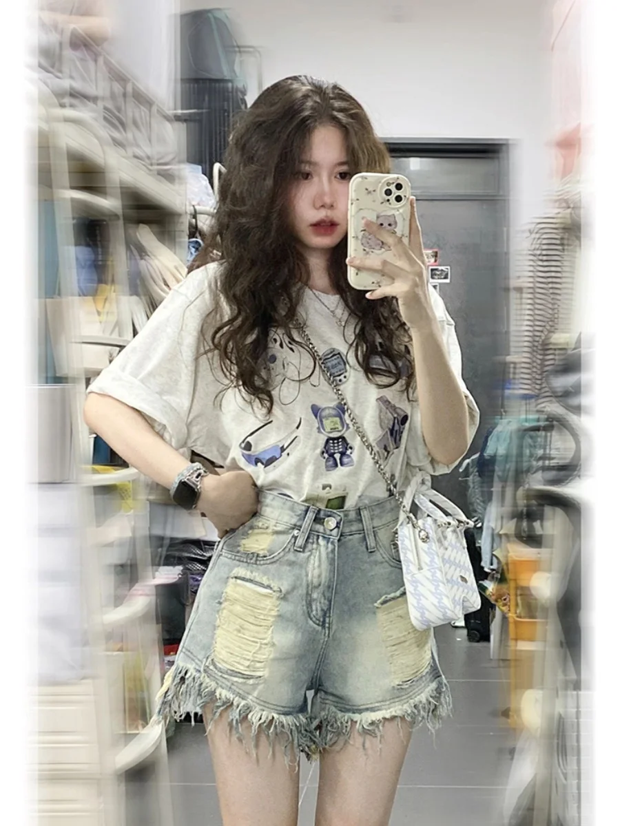 กางเกงยีนส์ขาสั้นเอวสูงแต่งพู่ขาดๆ สำหรับผู้หญิงไซส์ใหญ่ ทรงหลวม ขากว้าง ทรงเอ แฟชั่นฤดูร้อน สไตล์ลำลอง