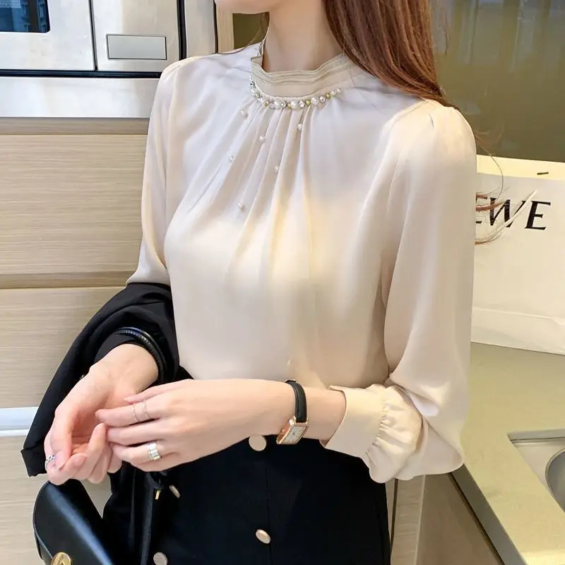 Elegant Solid Color Spliced Folds Beading Blouse Women\'s Clothing 2023 Spring New Casual Pullovers All-match Office Lady Shirt