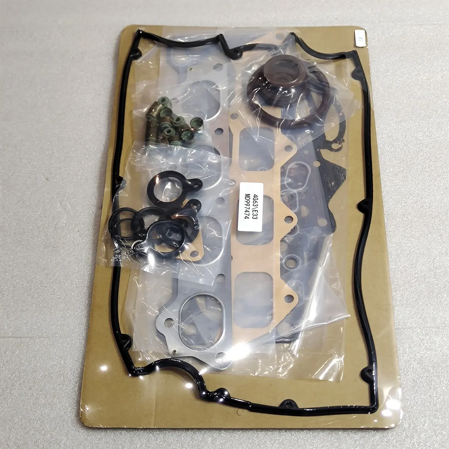 

4G63 E33 Детали машин Поставщик деталей двигателя 4G63 Полный комплект прокладок для капитального ремонта MD971989