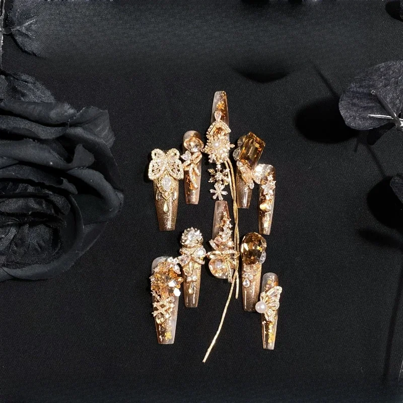 

Hand-worn armored amber cat's eye butterfly chain shows white winter