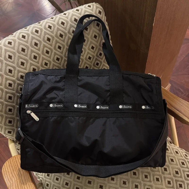 large-capacity-women's-travel-bag-handheld-short-trip-luggage-bag-no-label-nylon-material-with-pull-rod-for-business-trips
