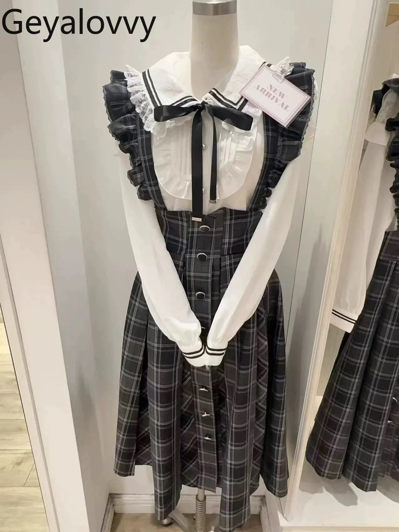 Herbst Neue Massenproduzierte College Stil Muster Flattern Ärmel Strap Midi Rock Süße Mädchen Hohe Taille Dünne Lange Hosenträger röcke