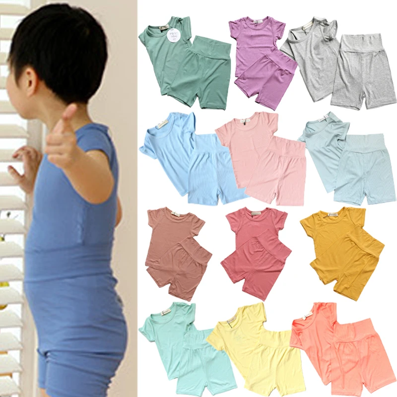 

Children's Clothing Set 2025 New Summer Boys Girls Cotton Casual Pajamas Kids Solid Color Short Sleeved Top Baby Clothes
