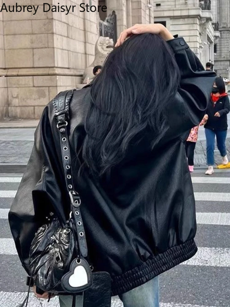 สีดําหลวมซิปเสื้อหนังยาวผู้หญิง Retro Casual Punk แจ็คเก็ตหนังเกาหลี High Street Moto Biker แจ็คเก็ตหนัง 2025