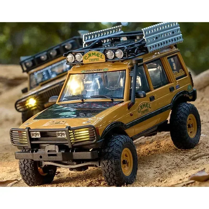 Fms 1:24 Fcx24m Camel Cup Simulation Defender 90/110, première génération, Range Rover Discovery, escalade, véhicule tout-terrain, en stock