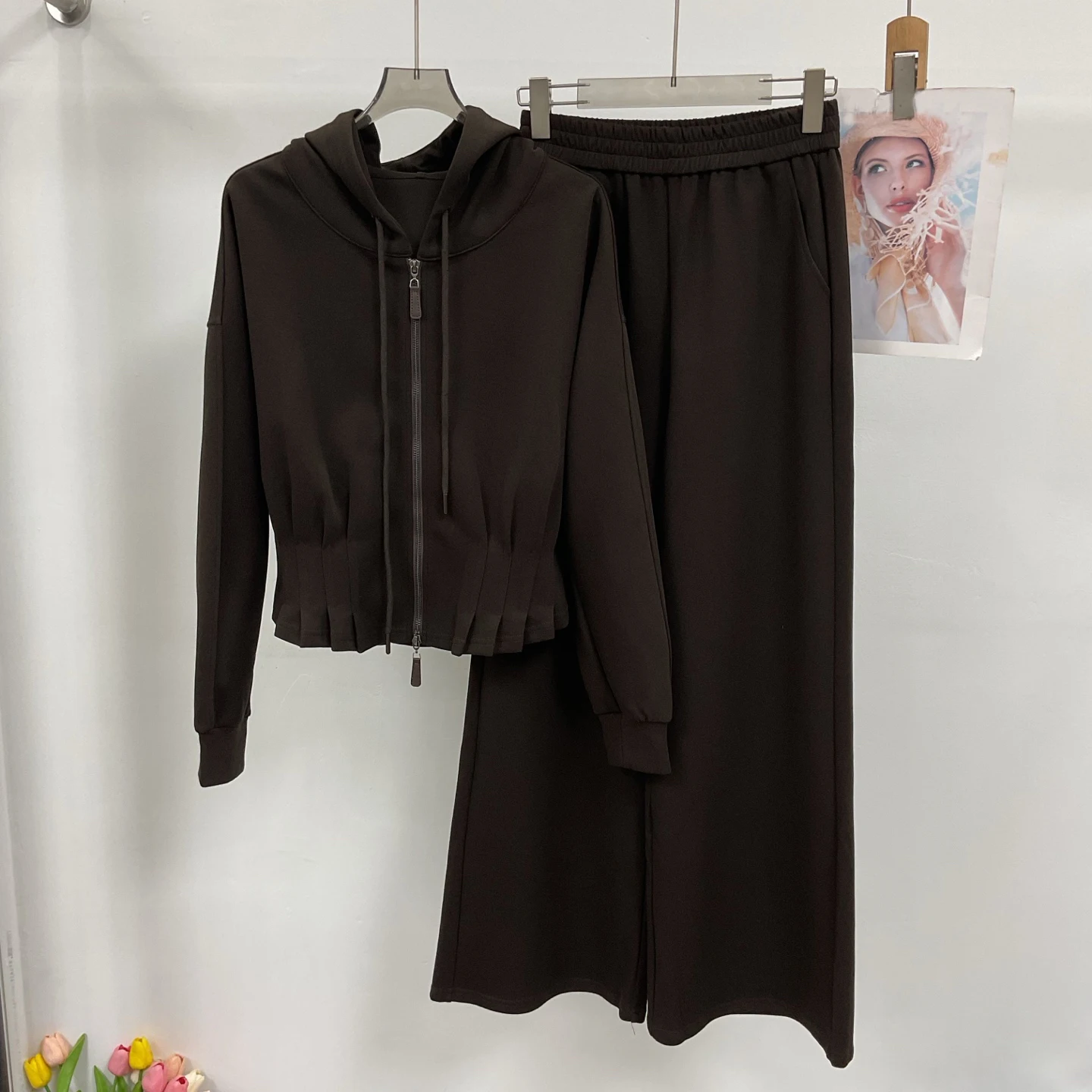 New Autumn Collection: A sleek, sophisticated hooded, waist-cinching jacket paired with wide-leg trousers.NO.29
