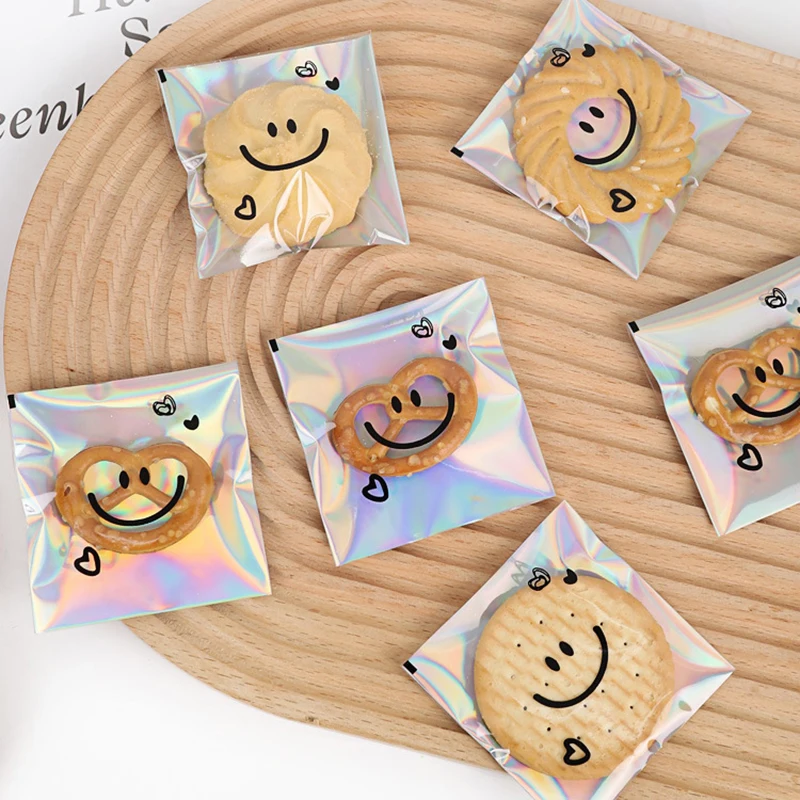 100pcs Cute Smiling Face Self-adhesive Bag Laser Transparent Biscuit Bag Cookie Packaging Bags Birthday Party Baby Shower