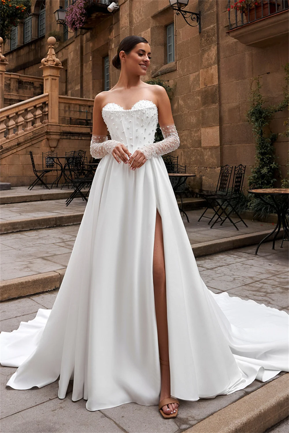 فساتين زفاف لامعة مطرزة بالترتر على شكل قلب من الساتان لحفلات الزفاف على شكل حرف A وأكمام طويلة وفتحة جانبية سويب تراين مصنوعة حسب الطلب 2026