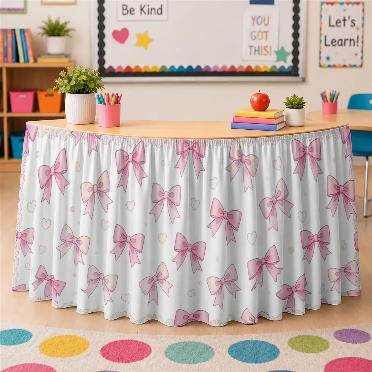 One table skirt with a butterfly knot pattern printed on it. A sweet and romantic design in a delicate pale pink color.