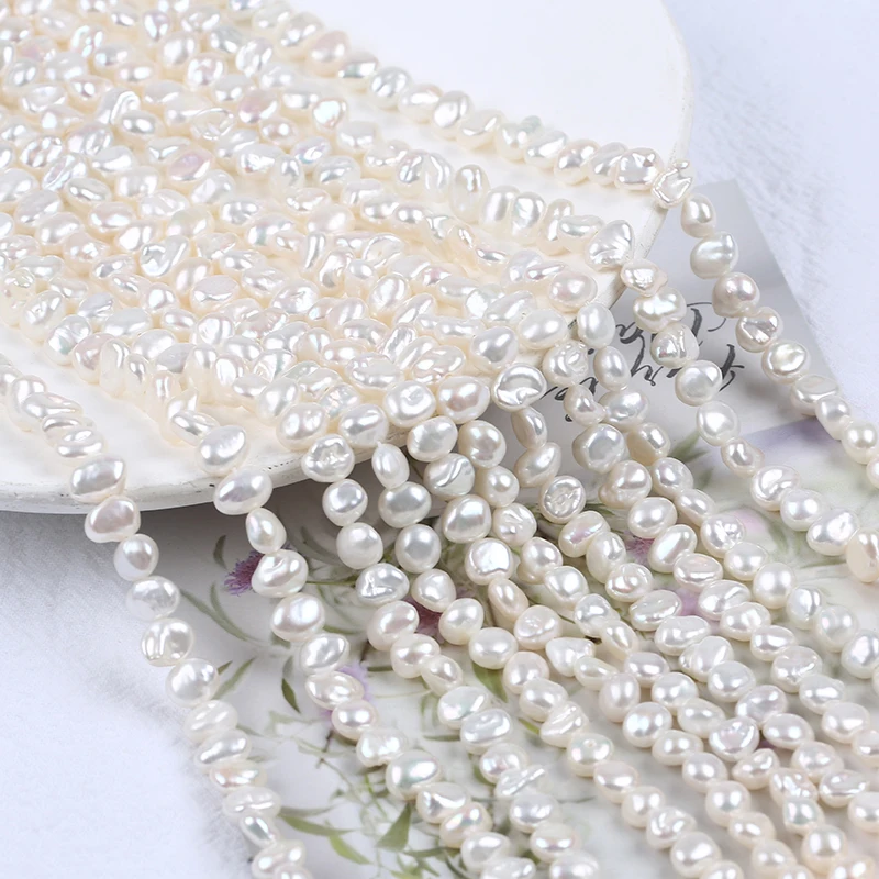 

5-6mm Natural White Keshi Freshwater Pearl Strand With Side Hole For Jewelry Making