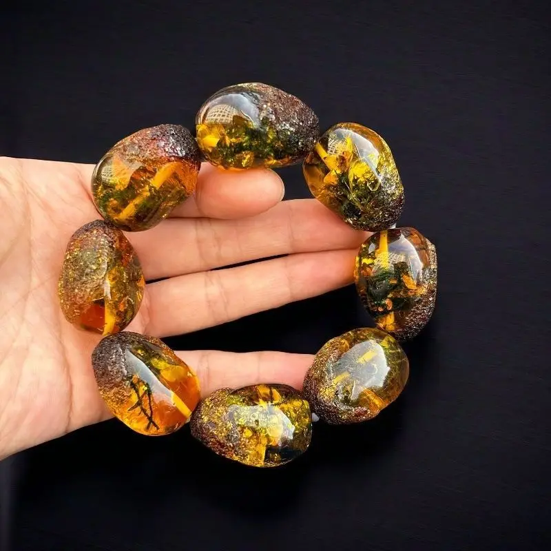 bracelet aquatic plants  a collectible hand ornament for handling and appreciation  featuring natural amber with aqua
