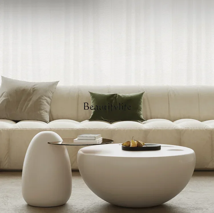 

06Italian minimalist cute cat claw coffee table light luxury round coffee table cream silent wind