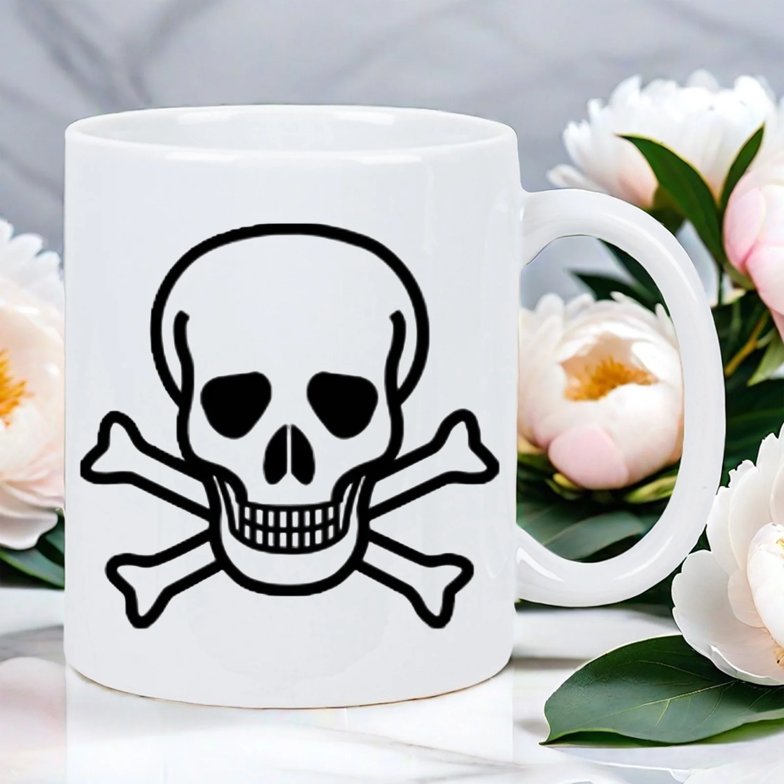 Pirate skull and crossbones ceramic mug, decorated with a black pirate flag logo, suitable for coffee, tea or hot drinks.