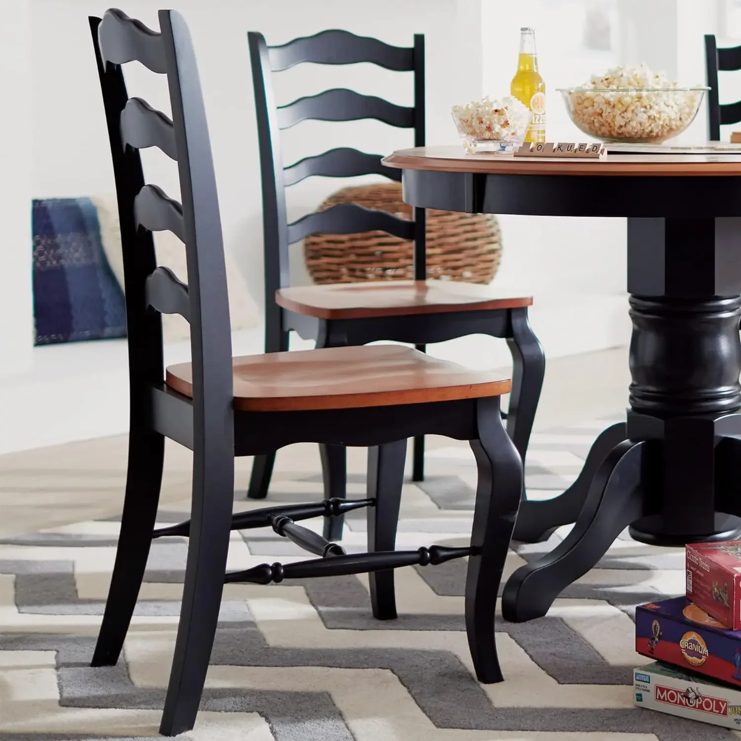 French Oak and Black Pair of Dining Chairs with Distressed Oak Contoured Seat, Rubbed Black Finish,and French Leg Design