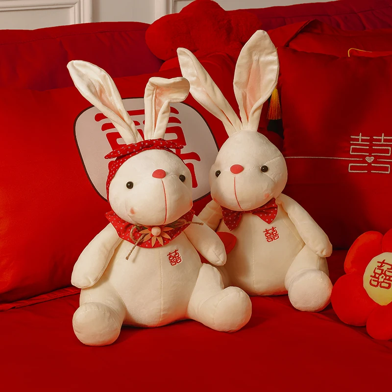 Bed pressing doll, wedding room, happy baby, a pair of plush rabbits