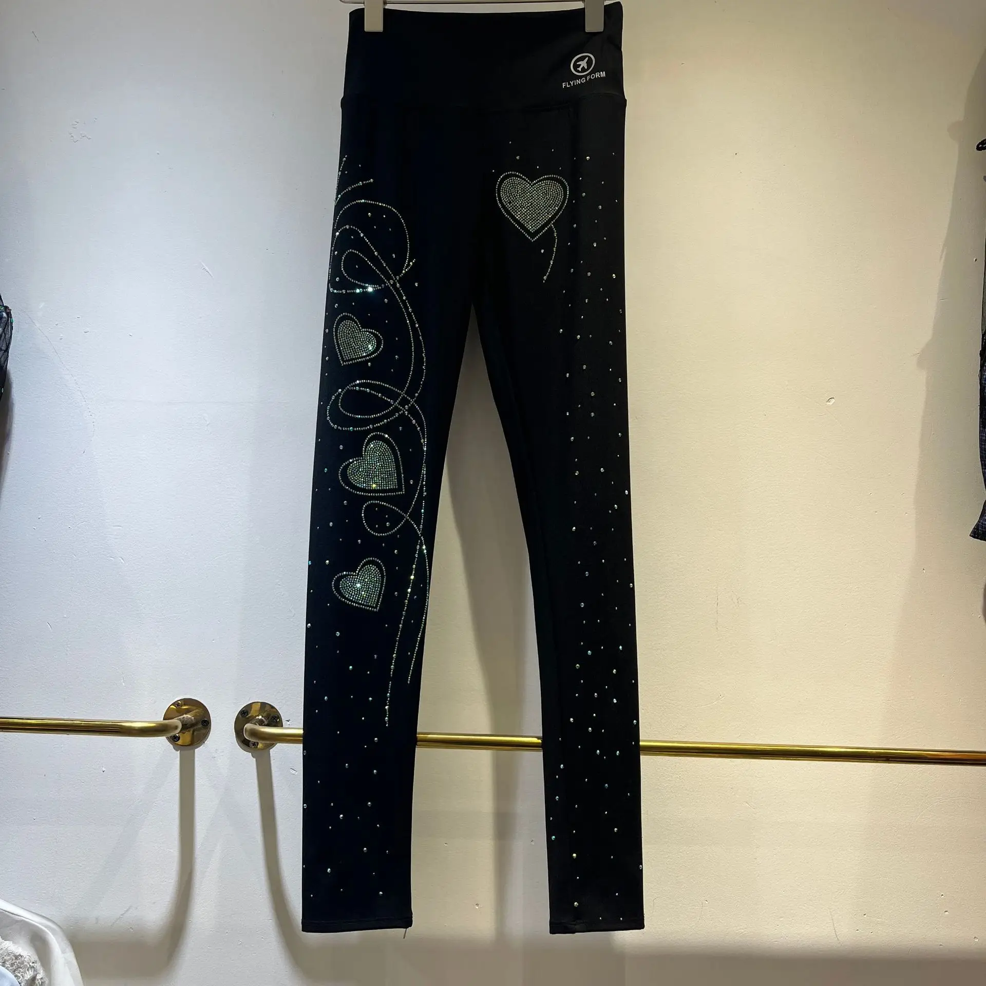 Produtos europeus indústria pesada amor forma quente diamante leggings feminino 2025 primavera nova cintura alta versátil calças casuais preto