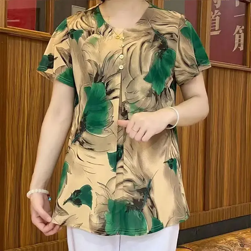 Casual Vintage Floral Printed Shirt Fashion Folds Button Women\'s Clothing O-Neck Loose 2023 Summer Short Sleeve Commute Blouse