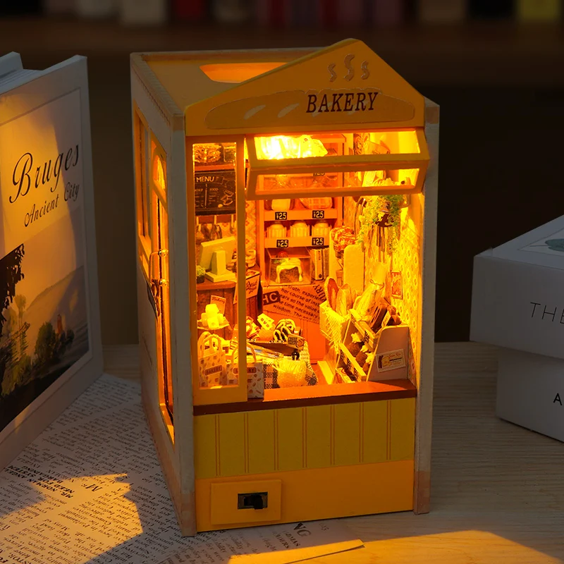 DIY Buchecke Regal Kits Bäckerei Shop Casa Holz Miniatur Modell Kit handgemachte Casa Buchstütze mit Licht Bücherregal Freunde Geschenke