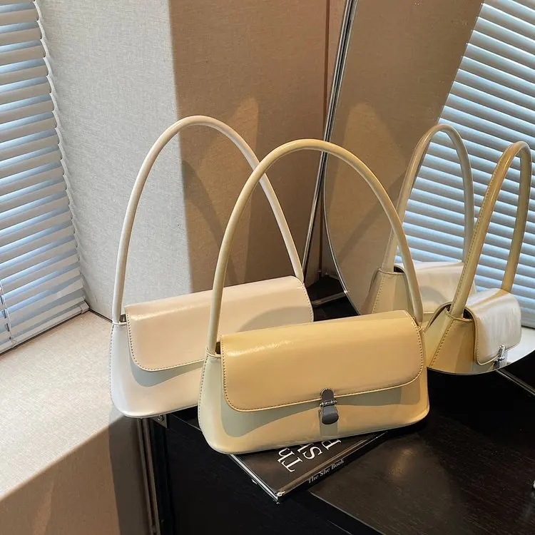 

Small Item Friendly Diaper Bag with Dedicated Slots for Pacifiers Teethers and Other Tiny Goods