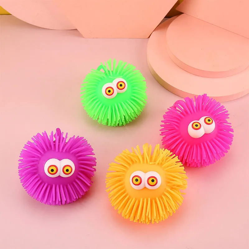 Creative cartoon protruding eye hair flash elastic ball kneading music children\'s soft glue decompression venting toy K4