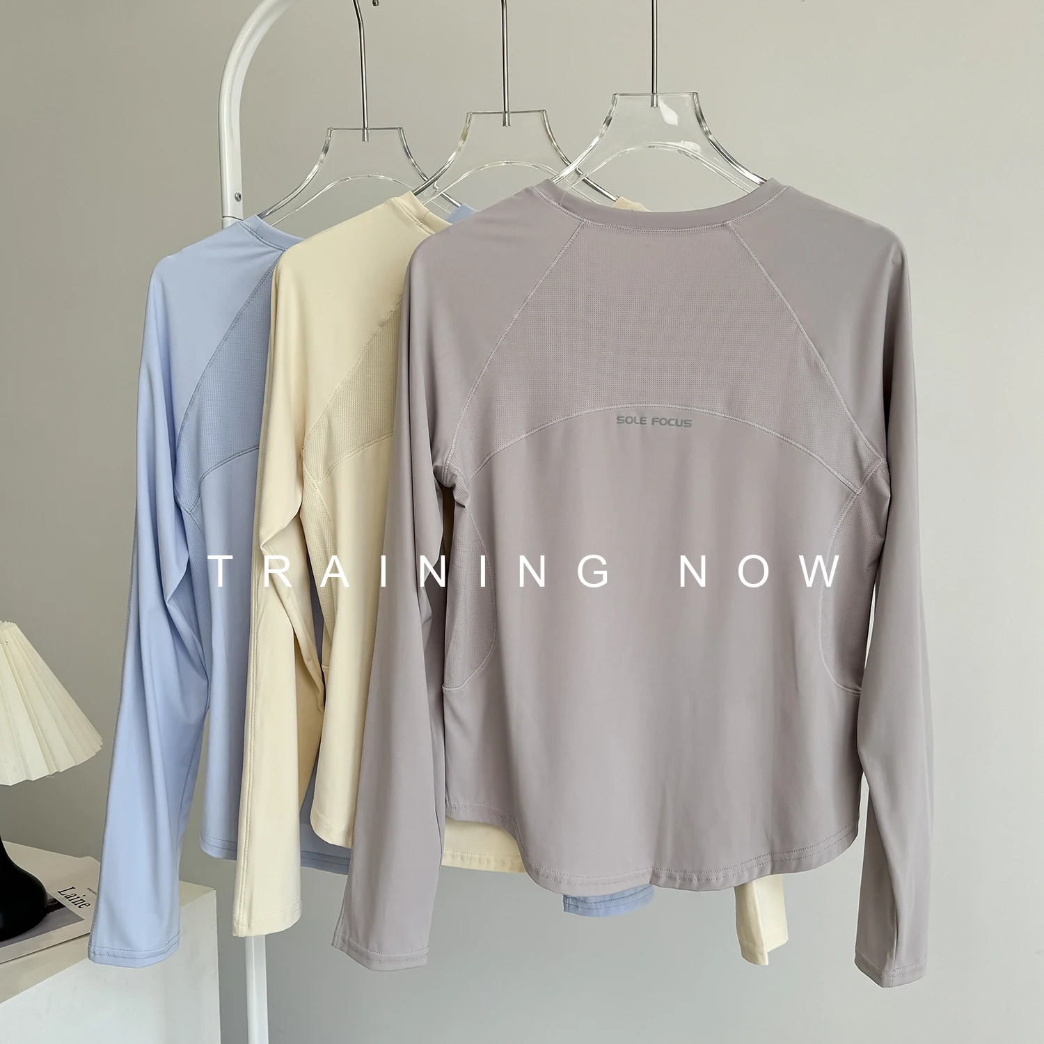 

Loose yoga wear long-sleeved women's autumn running training mesh breathable top professional fitness sports quick-drying