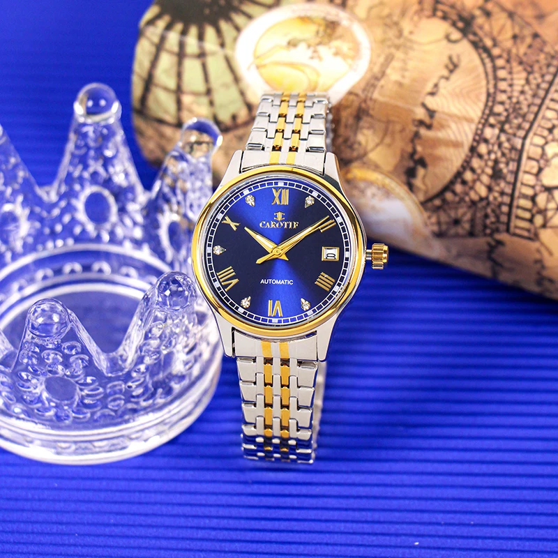 A lady's gold steel strap with a stylish blue dial date automatic mechanical watch