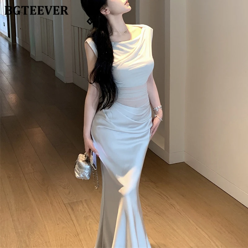 BGTEEVER فستان صيفي أنيق للسيدات نحيف مرقع من الساتان أنيق برقبة دائرية للنساء بدون أكمام فستان الورك