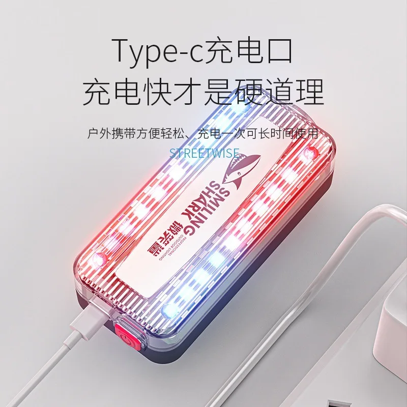 Spie lampeggianti rosse e blu con ricarica USB sulle spalle