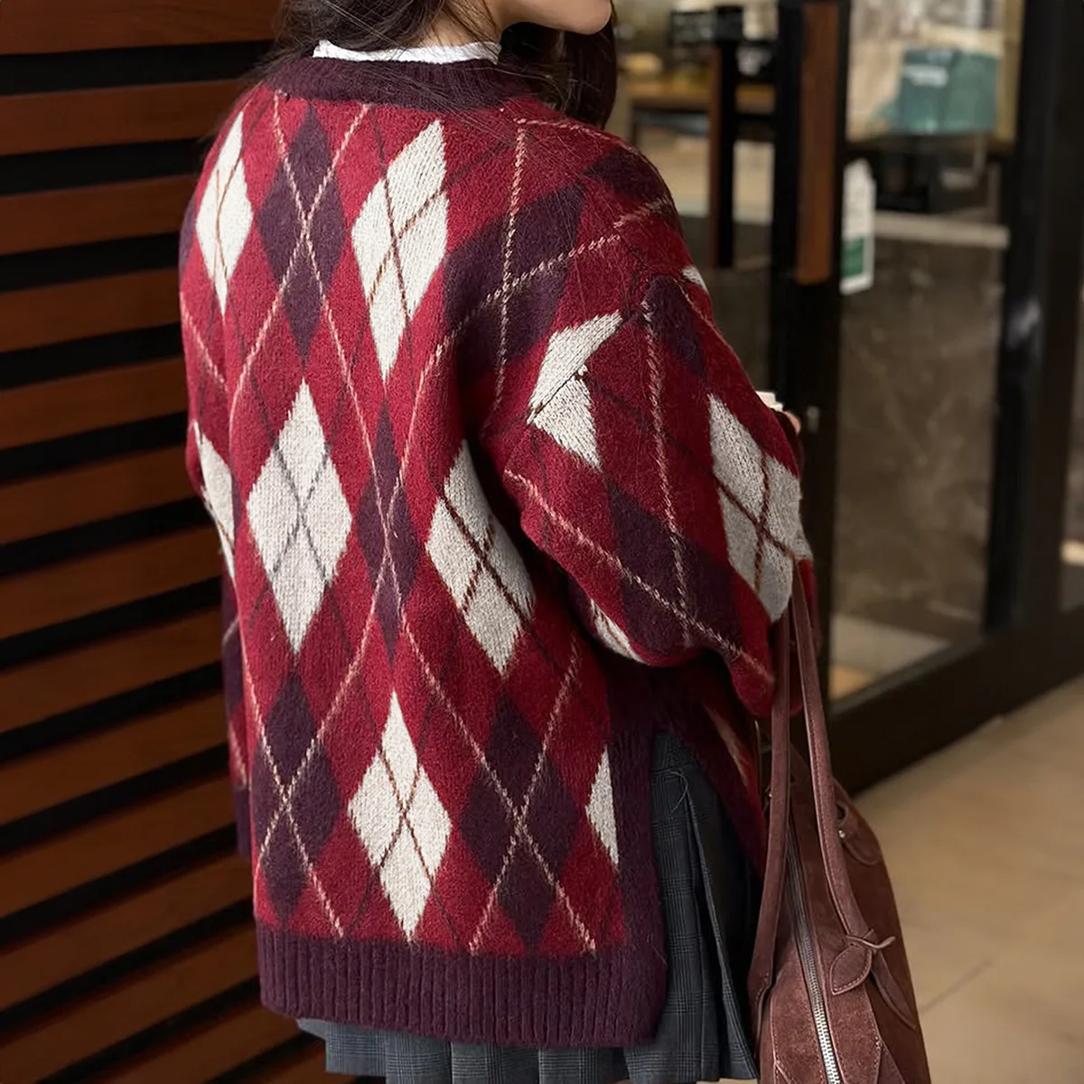 NOWA bluza damska z dzianiny w bloki kolorów na jesień i zimę 2026, z długim rękawem, codzienna bluza wkładana przez głowę, kolorowa, swobodna odzież domowa.