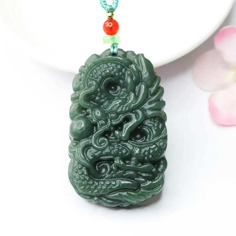 

Natural Tabqing Hetian Jade Dragon Pearl Pendant Power Charm HT2032103