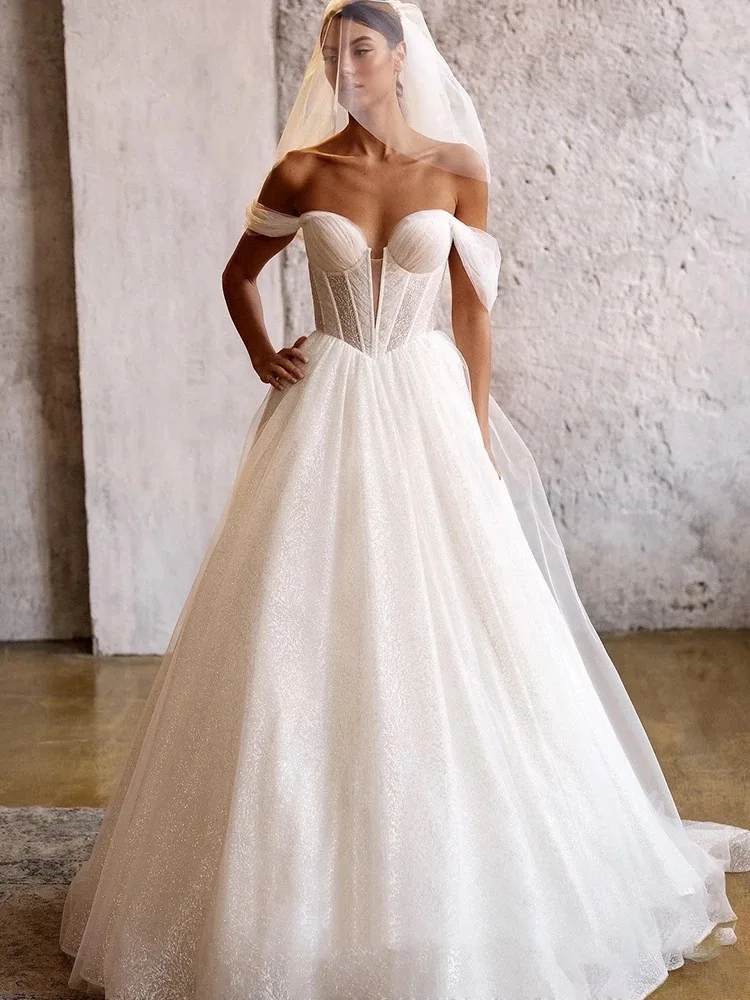 Maßgeschneiderte, glänzende, schicke Brautkleider aus Organza mit Stickerei, Pailletten, A-Linie, Braut-Boot-Ausschnitt, ärmellose Robe De Mariee