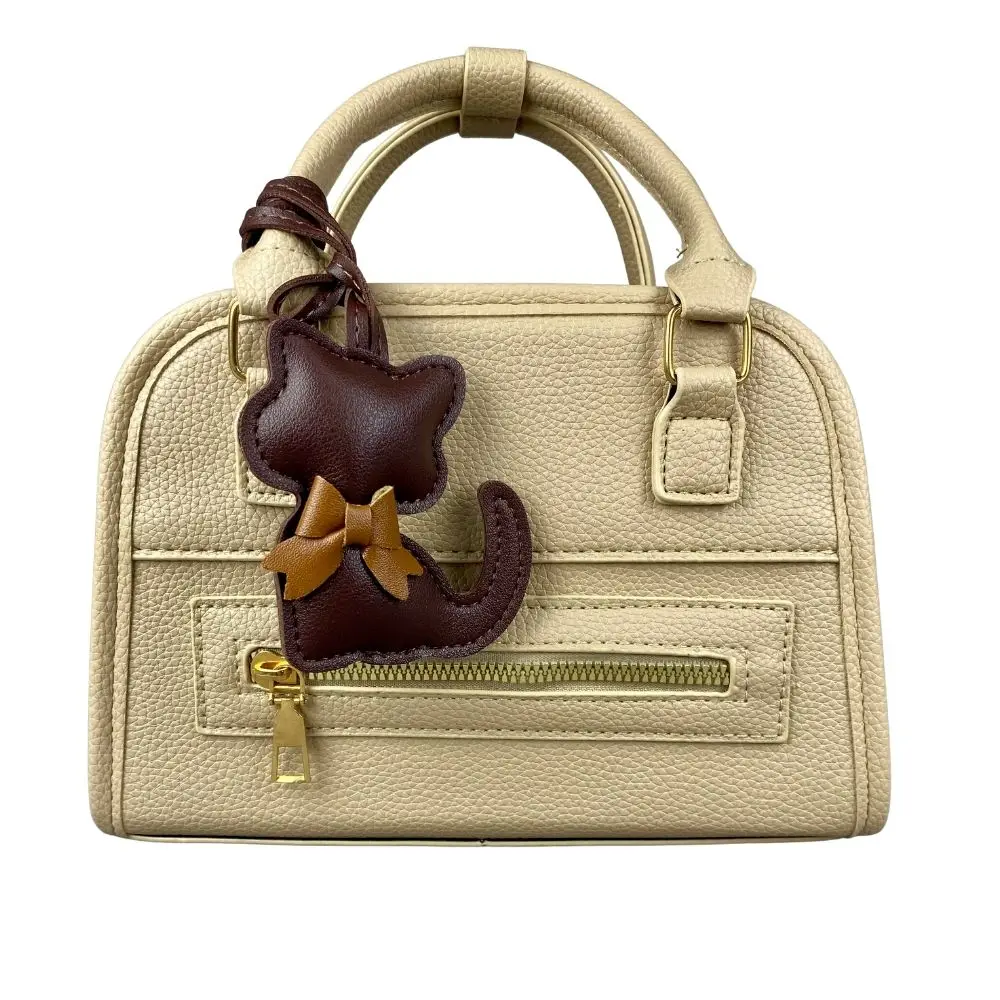 سلاسل مفاتيح مصنوعة يدويًا من الجلد على شكل قطة - تفاصيل ربطة عنق رائعة، 12 لونًا - هدية مثالية من جلد البولي يوريثان - مثالية لإكسسوارات الحقائب