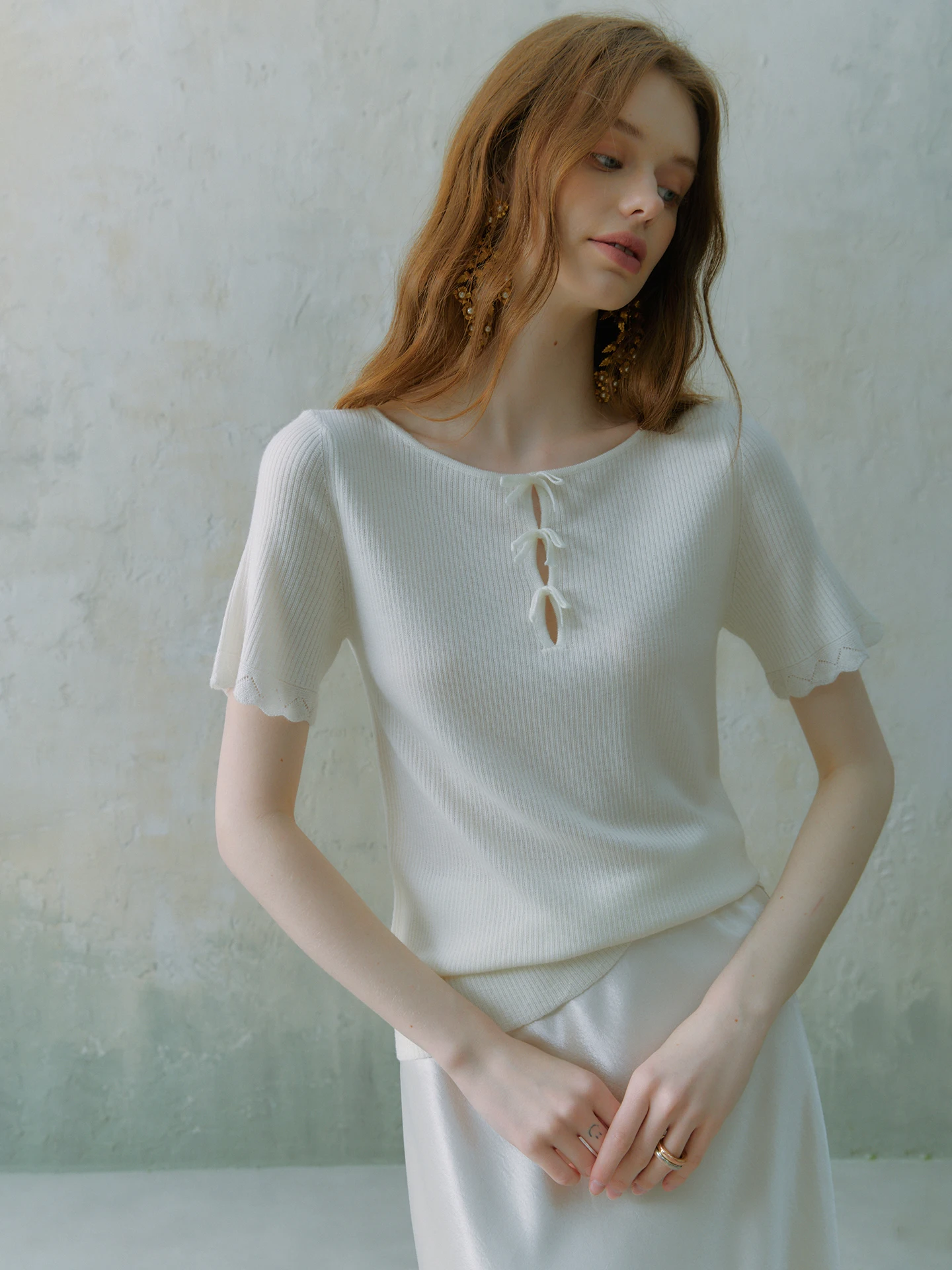 

Miu Series Anti-Aging Knot Hollow out Slim Fit Short Sleeve Wool Knitted T-Shirt Women Summer Top French Style