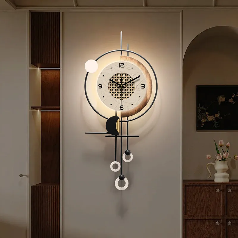 Modern Metal Wall Clock with Moon and Ball Pendants Warm LED Backlight Decorative Art Clock for Living Room Bedroom Home Decor