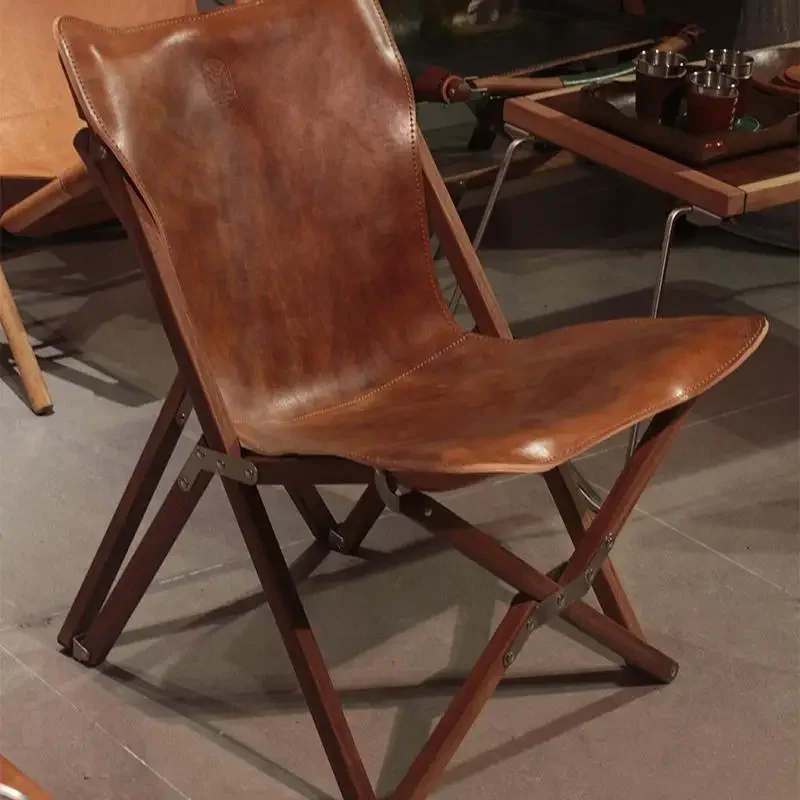 Chaise papillon camping bois massif peau de vache pliante