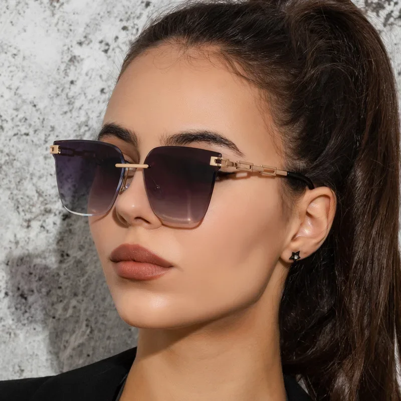 New Fashion Rimless Cut Edge Sunglasses for Men and Women Metal Hollowed-out Progressive Color Shades Ocean Glasses