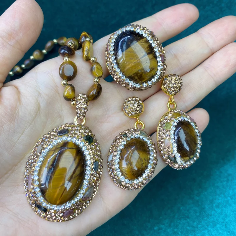 Große Ovale Tigeraugen-Kristallstein-Schmucksets für Frauen Katzenaugen Natürliche Muschel-Strang-Kette Halskette