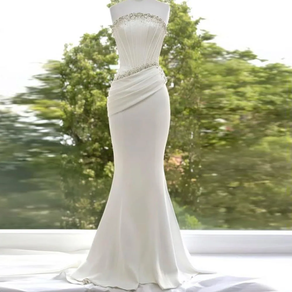 ชุดแต่งงานทรงเมอร์เมดแบบคอร์เซ็ทไร้สาย ปรับแต่งได้ ประดับลูกปัด ผ้าซาติน จับจีบ ทรงเข้ารูป สีขาว ยาว