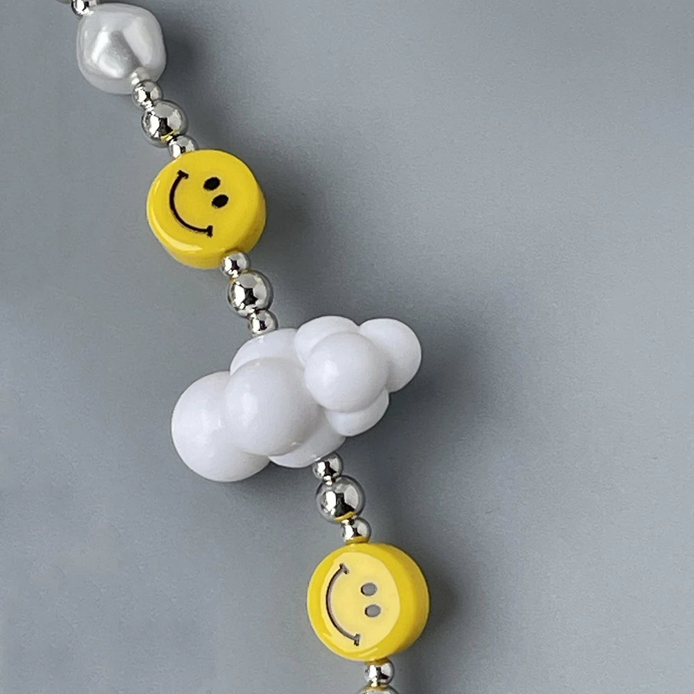 Porte-clés de cosplay de la série télévisée Faye, porte-clés de téléphone en résine, clé de nuage blanc, pendentif visage souriant, accessoires de sac, accessoire